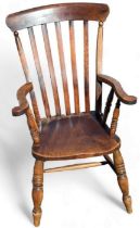 A stained Elm Windsor armchair, 102cm, 63cm, 50cm