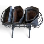 Four metal hoppers and metal basket planter