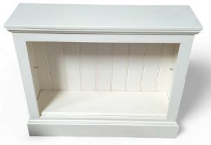 A cream painted open-shelved bookcase, 95cm, 28.5c