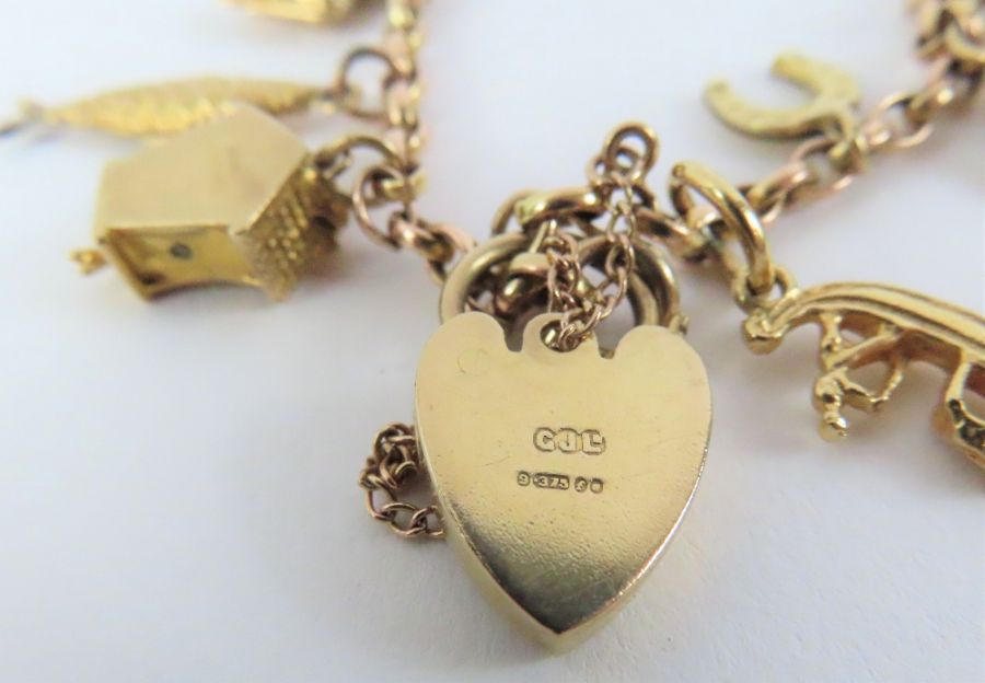 A 9ct gold belcher link charm bracelet, with vario - Image 2 of 2