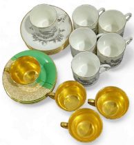 Crown Devon: four demitasse cups and saucers, and
