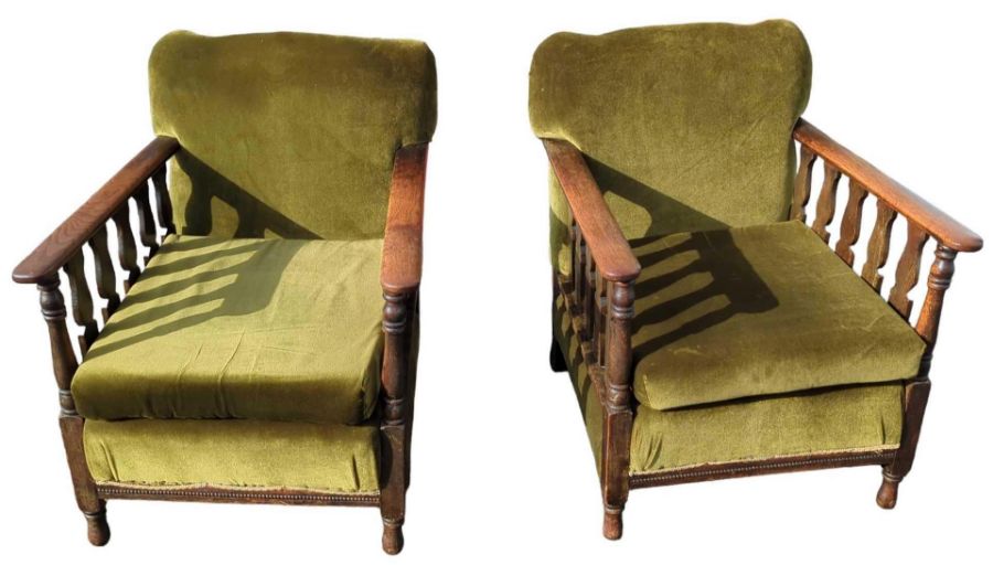 Pair of Edwardian elm framed “tub” armchairs, with