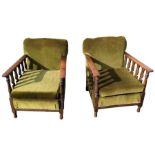 Pair of Edwardian elm framed “tub” armchairs, with