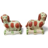 A pair of reproduction Staffordshire figures in th