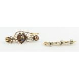 An Edwardian bar brooch set with seed pearls and d