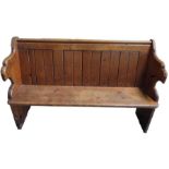 A 19th century stained pine church pew, 144cm, 50c