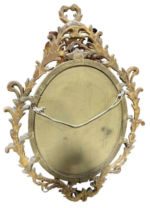 A large decorative gilt wall mirror with scrolling - Image 2 of 2