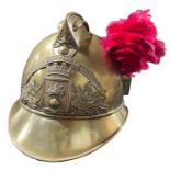 An early 20th Century brass French Firemans helmet