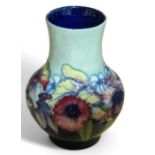 MOORCROFT: An Orchid pattern vase, baluster form a