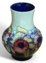 MOORCROFT: An Orchid pattern vase, baluster form a