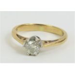A diamond solitaire ring, marked '.33' to the insi