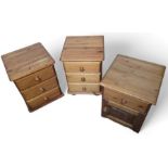 A pair of contemporary pine bedside tables, and on