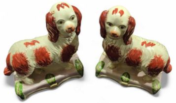 A pair of reproduction Staffordshire figures in th