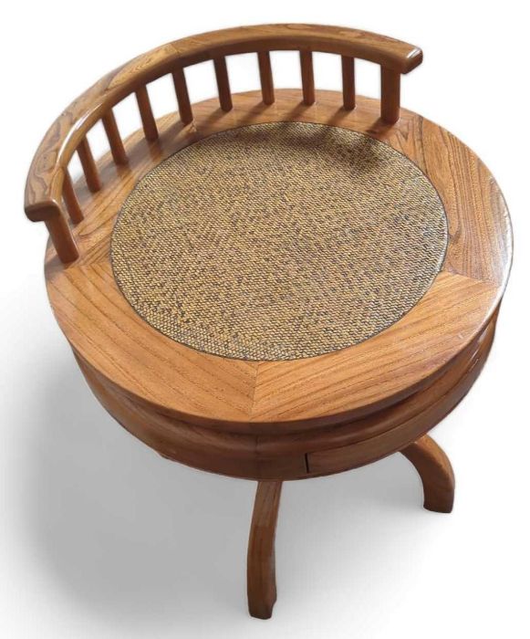 A hardwood circular occasional table, with single