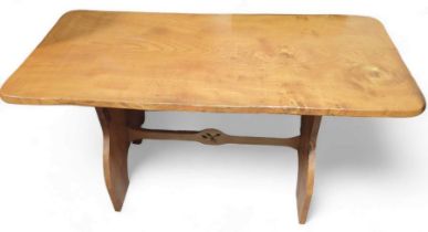 A pine refectory dining table, with stretcher belo