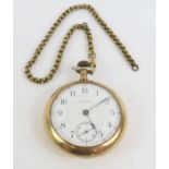 A Waltham gold plated pocket watch, the white enam