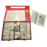 A Mah Jong set, boxed and with instructions