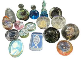 A collection of assorted decorative glass paperwei