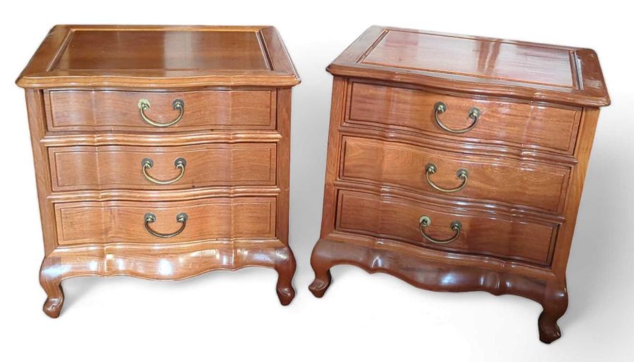 A pair of contemporary Chinese hardwood bedside ta