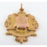 A 9ct gold fob medal, the front with usual engrave