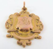 A 9ct gold fob medal, the front with usual engrave