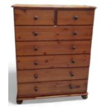 A contemporary stained pine chest of drawers, 89cm