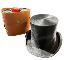 A gentlemans black silk top hat by Dunn & Co toget