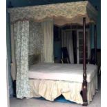 A Country House style four poster bed