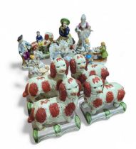 Collection of ceramic figurines including reproduc