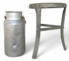A galvanised milking stool and a milk cannister