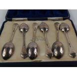 A cased set of six Mappin and Webb tea spoons, wit