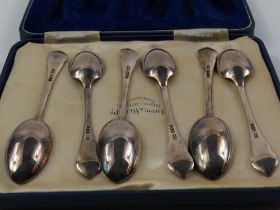 A cased set of six Mappin and Webb tea spoons, wit