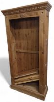 An open pine bookcase, with carved cornice, 89cm x