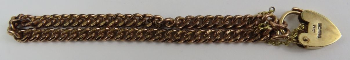 A 9ct gold filed curb link bracelet, with every li