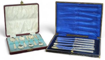 Cased set of silver handled butter knives, and a c