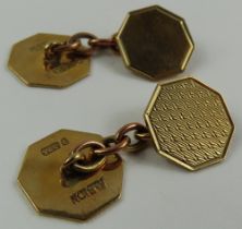 A pair of 9ct gold octagonal shaped cufflinks, wit