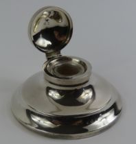 A silver capstan inkstand (weighted)