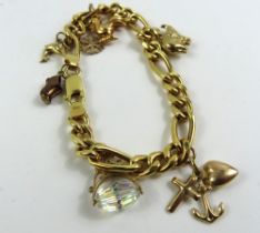A 9ct gold hollow figaro link bracelet, with vario