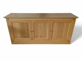 A Contemporary oak sideboard, the rectangular top