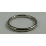 A wedding ring marked 'PLATINUM', finger size M 1/