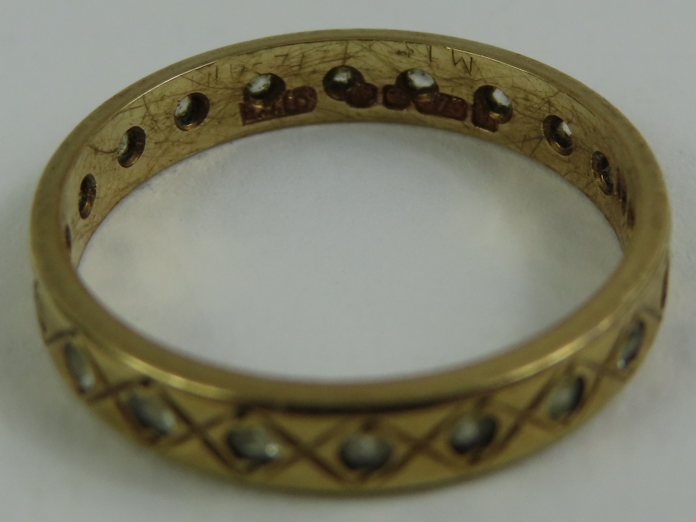 A 9ct gold white stone full eternity ring, finger - Image 2 of 5