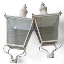 Pair of white plastic outdoor lamps