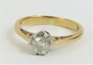 A diamond solitaire ring, marked '.33' to the insi