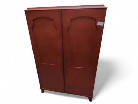 An eastern red painted cupboard, 101cm x 41cm x 15