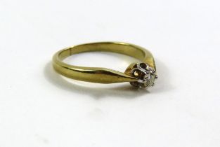 A diamond solitaire ring, marked '585', finger siz