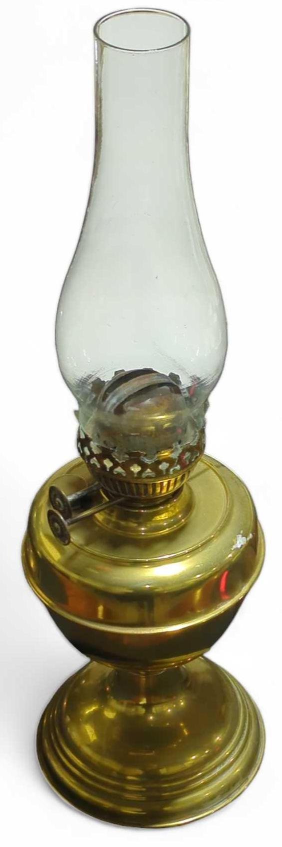 An early 20th century brass oil lamp