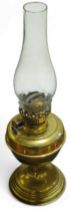 An early 20th century brass oil lamp