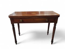 A George IV mahogany tea table, on reeded tur