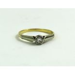 A single stone illusion set diamond ring, finger s