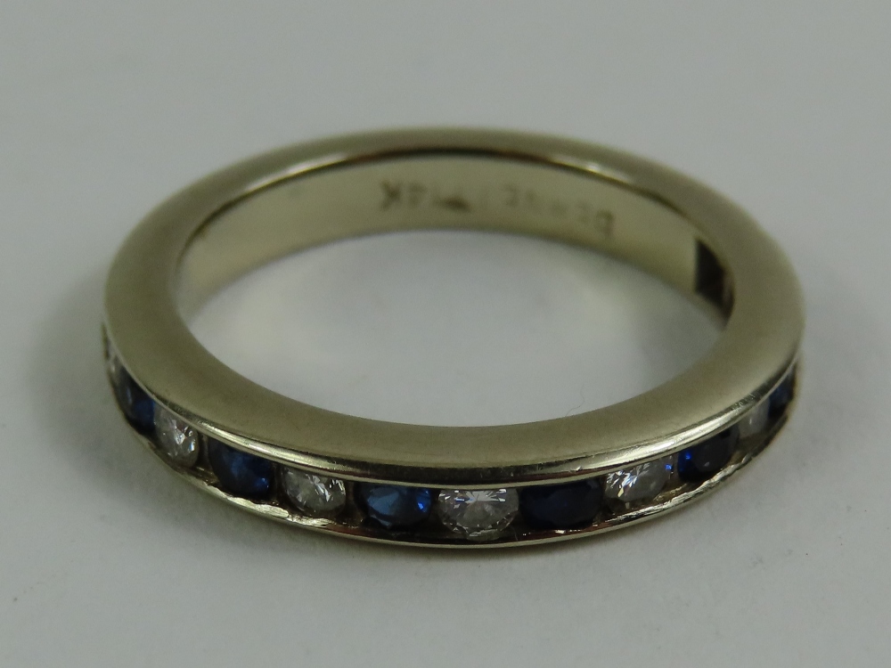 A channel set sapphire and diamond half eternity r - Image 4 of 5